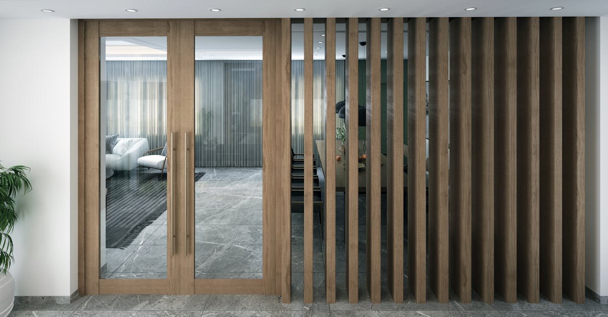 séparez élégamment vos espaces avec une cloison en verre d'entrée, alliant transparence et design moderne pour une ambiance lumineuse et accueillante.